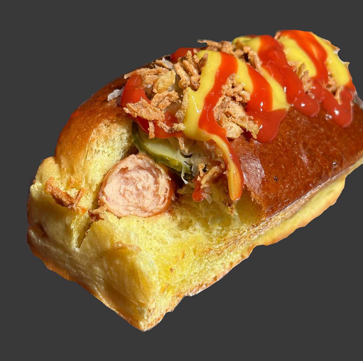 Das Hamburger Hot Dog im Schlafrock ist im Anbiss sehr appetitlich. Schmeckt jedoch abscheulich süß.