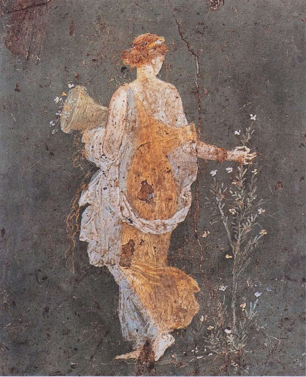 Römisches Fresko der Göttin Flora aus Pompeji. Die weibliche Figur trägt ein Gewand, hält ein Füllhorn und streut Blumen als Sinnbild des Frühlings und der blühenden Natur.